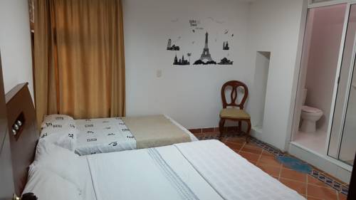 Imagen de la habitación del Hotel El Sol La 27. Foto 2