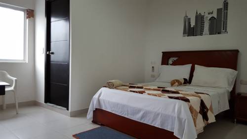 Imagen de la habitación del Hotel El Sol La 27. Foto 4