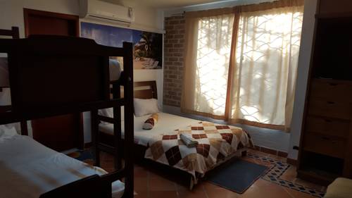 Imagen de la habitación del Hotel El Sol La 27. Foto 5