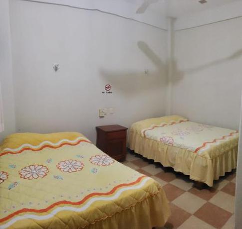 Imagen de la habitación del Hotel El flechador del sol. Foto 11