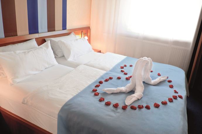 Imagen de la habitación del Hotel Elysee. Foto 16