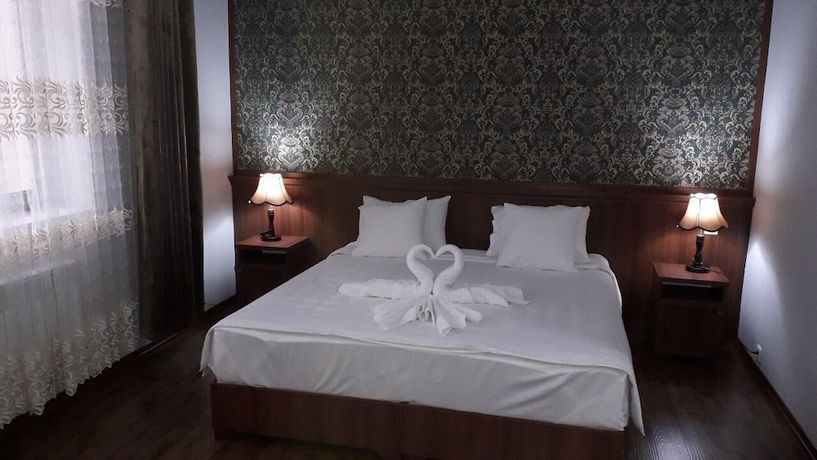 Imagen de la habitación del Hotel Erkin Palace. Foto 5