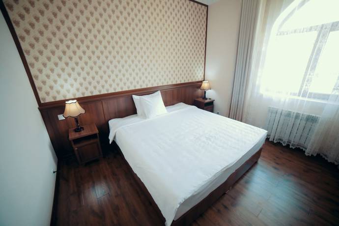 Imagen de la habitación del Hotel Erkin Palace. Foto 7