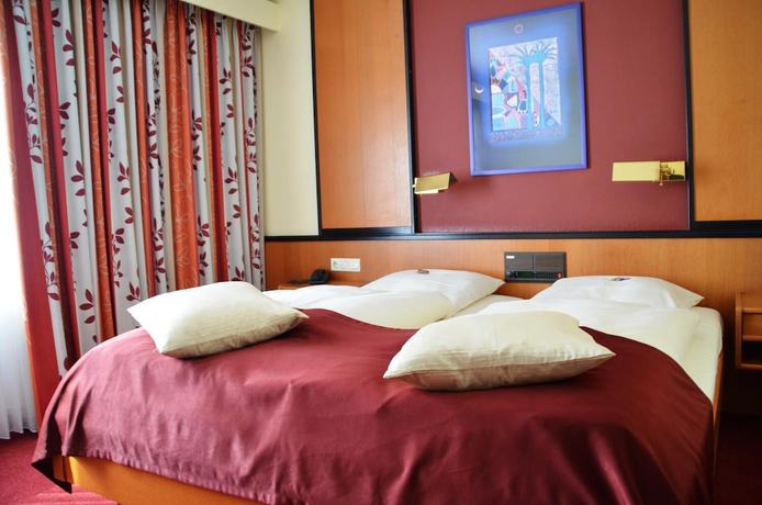 Imagen de la habitación del Hotel Exquisit. Foto 4