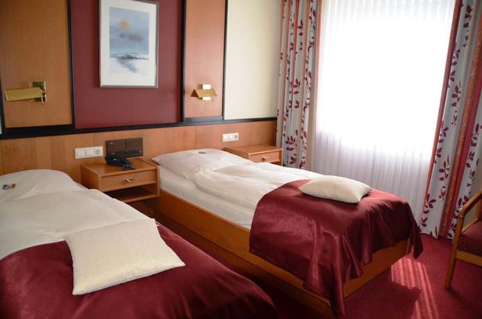 Imagen de la habitación del Hotel Exquisit. Foto 7
