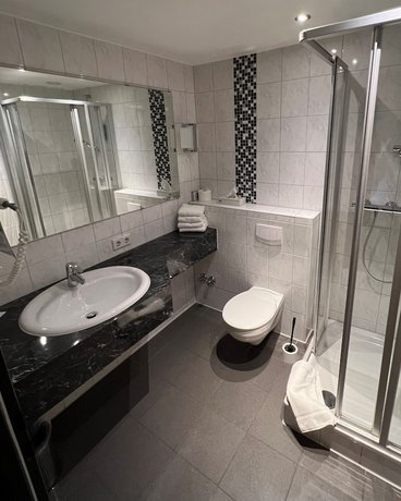 Imagen de la habitación del Hotel Exquisit. Foto 15