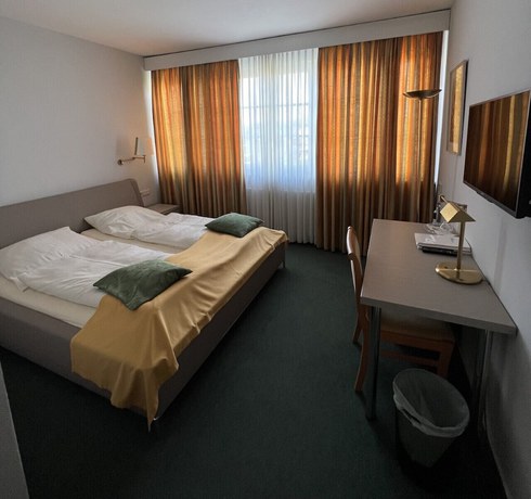 Imagen de la habitación del Hotel Exquisit. Foto 17