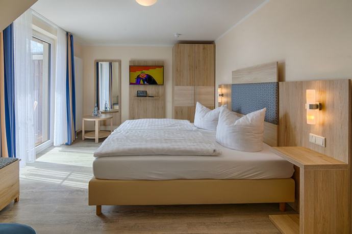 Imagen de la habitación del Hotel Ferienanlage Haffhus. Foto 4