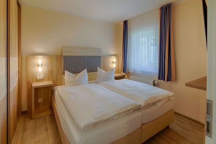 Imagen de la habitación del Hotel Ferienanlage Haffhus. Foto 15