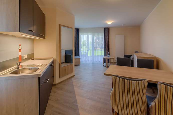 Imagen de la habitación del Hotel Ferienanlage Haffhus. Foto 17