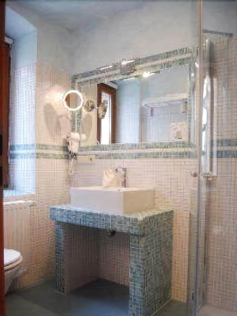 Imagen de la habitación del Hotel Figo. Foto 18