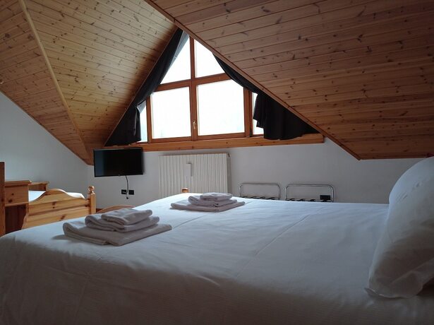 Imagen de la habitación del Hotel Fior di Roccia Valmalenco. Foto 12