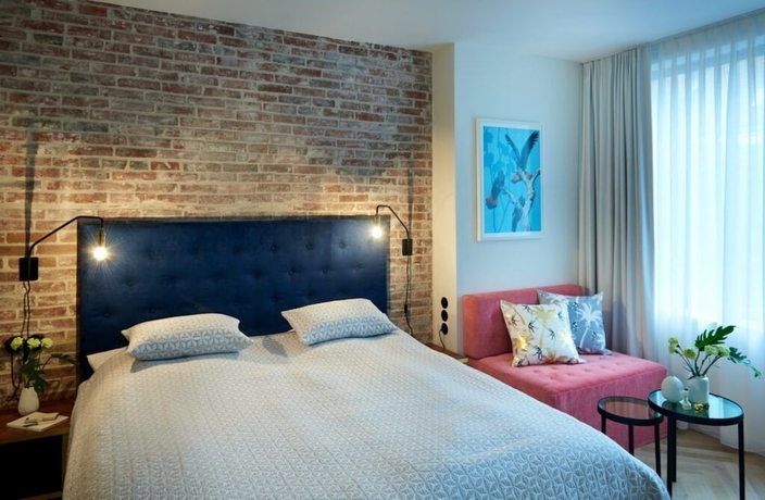 Imagen de la habitación del Hotel Five Rooms. Foto 2