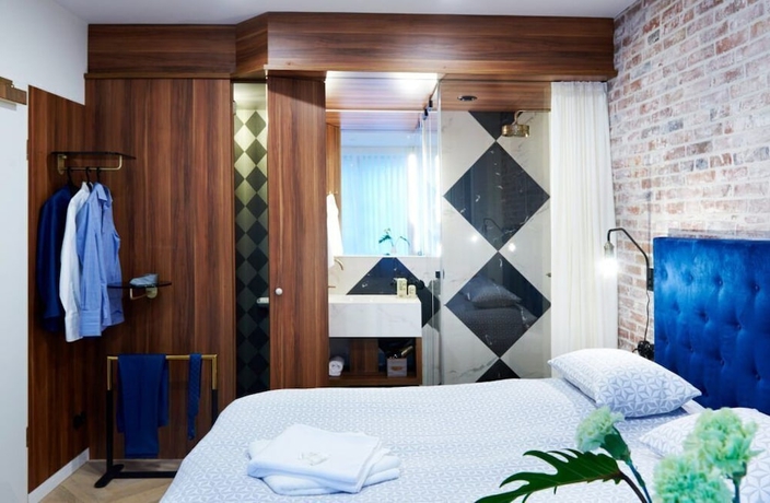 Imagen de la habitación del Hotel Five Rooms. Foto 3