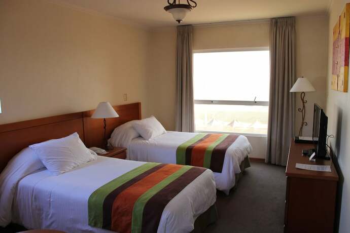 Imagen de la habitación del Hotel Florencia Suites and Apart. Foto 20