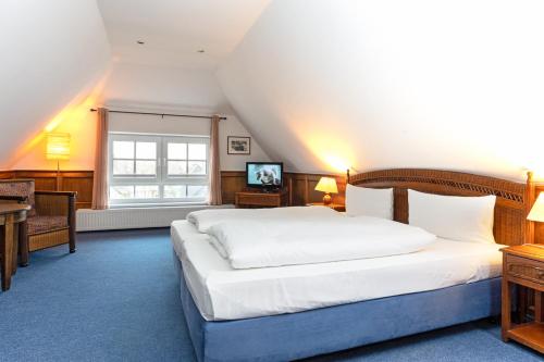 Imagen de la habitación del Hotel GODEWIND. Foto 15