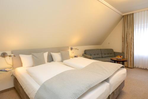 Imagen de la habitación del Hotel GODEWIND. Foto 20