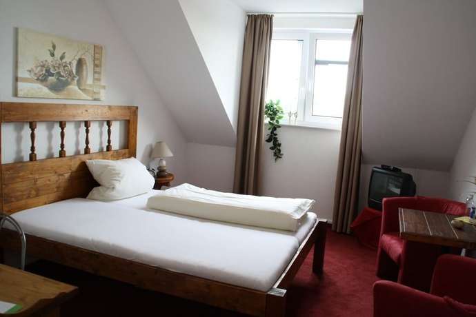 Imagen de la habitación del Hotel Gardenia. Foto 9