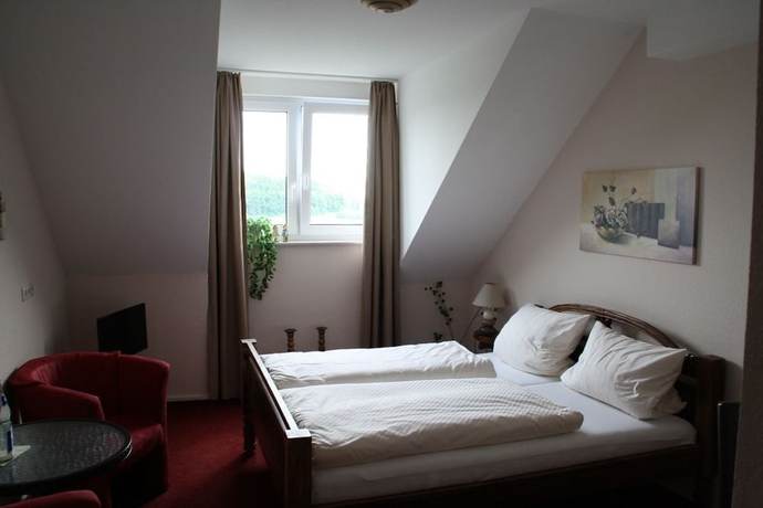 Imagen de la habitación del Hotel Gardenia. Foto 17