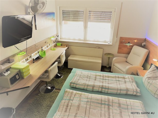 Imagen de la habitación del Hotel Garni 4U. Foto 11