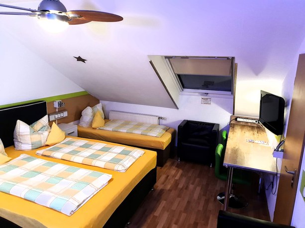 Imagen de la habitación del Hotel Garni 4U. Foto 14