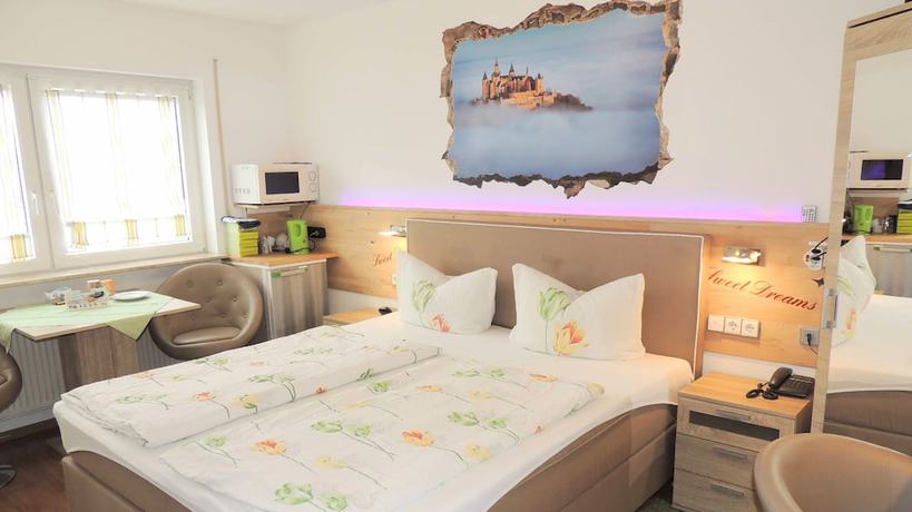 Imagen de la habitación del Hotel Garni 4U. Foto 15