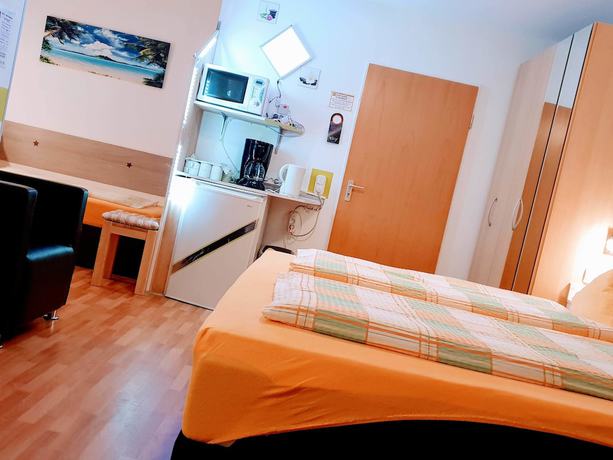 Imagen de la habitación del Hotel Garni 4U. Foto 16