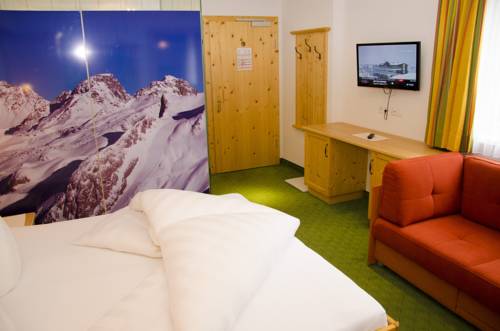 Imagen de la habitación del Hotel Garni Alpenblick. Foto 12