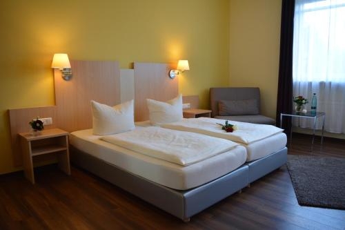 Imagen de la habitación del Hotel Garni Am Obsthof Gbr. Foto 10