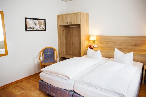 Imagen de la habitación del Hotel Garni Am R&ouml;merplatz. Foto 6