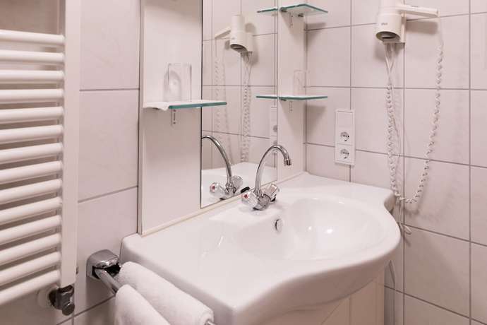 Imagen de la habitación del Hotel Garni Cafe im Hamm. Foto 17