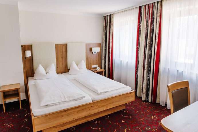 Imagen de la habitación del Hotel Garni Fuchs. Foto 17