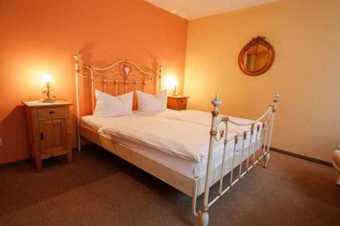 Imagen de la habitación del Hotel Garni Gästehaus Merk. Foto 10