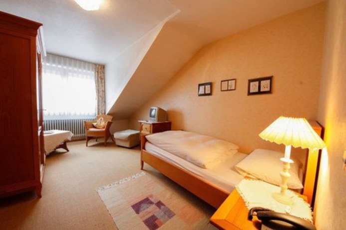 Imagen de la habitación del Hotel Garni Gästehaus Merk. Foto 11