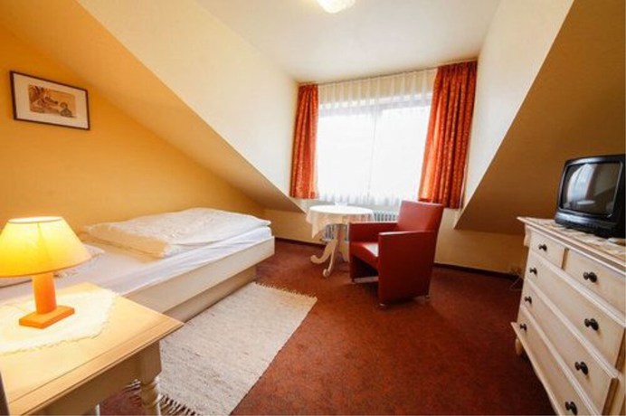 Imagen de la habitación del Hotel Garni Gästehaus Merk. Foto 18