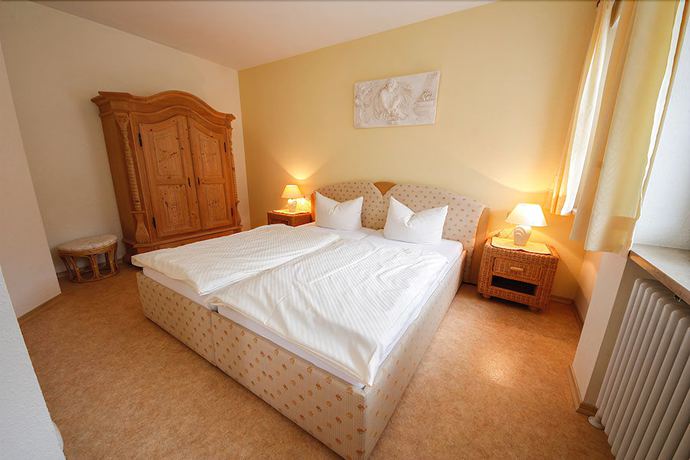 Imagen de la habitación del Hotel Garni Gästehaus Merk. Foto 19