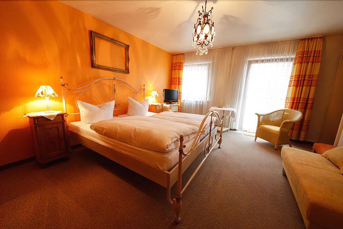 Imagen de la habitación del Hotel Garni Gästehaus Merk. Foto 20