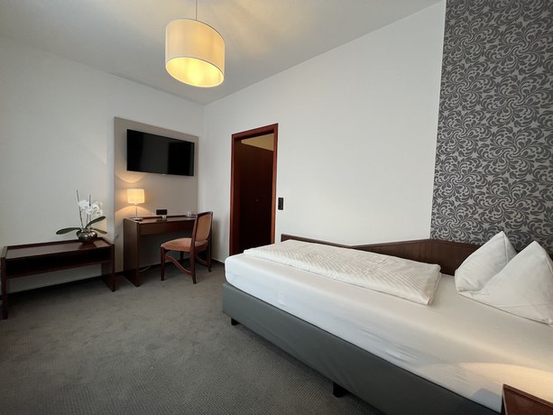 Imagen de la habitación del Hotel Garni Geisler. Foto 14