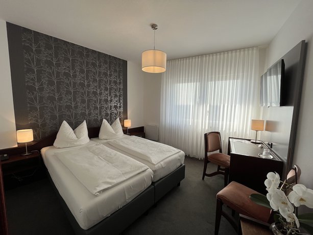 Imagen de la habitación del Hotel Garni Geisler. Foto 17