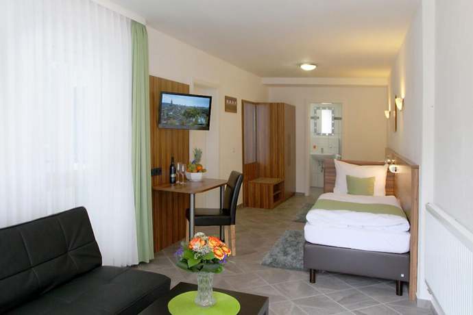 Imagen de la habitación del Hotel Garni Goldene Traube. Foto 4