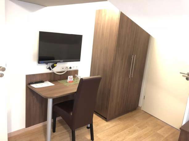 Imagen de la habitación del Hotel Garni Goldene Traube. Foto 10