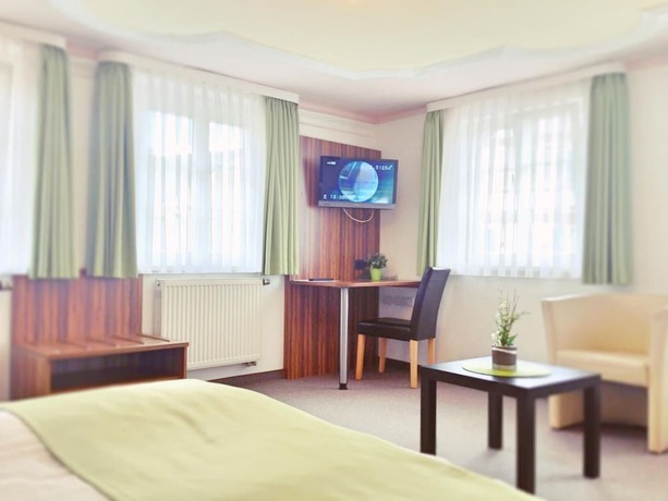 Imagen de la habitación del Hotel Garni Goldene Traube. Foto 11