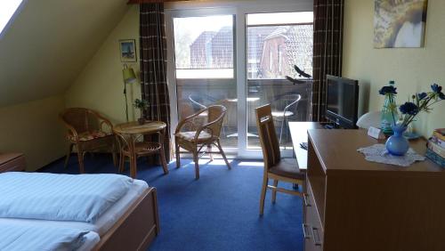 Imagen de la habitación del Hotel Garni Goldener Anker. Foto 5
