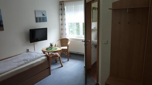 Imagen de la habitación del Hotel Garni Goldener Anker. Foto 7