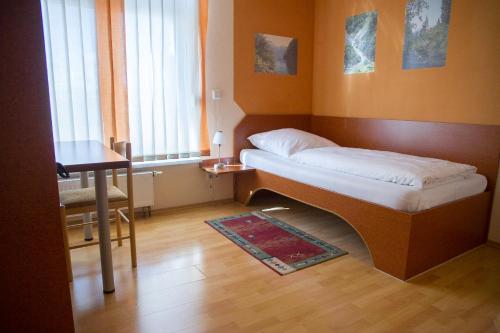 Imagen de la habitación del Hotel Garni Haus Zum Gutenberg. Foto 5