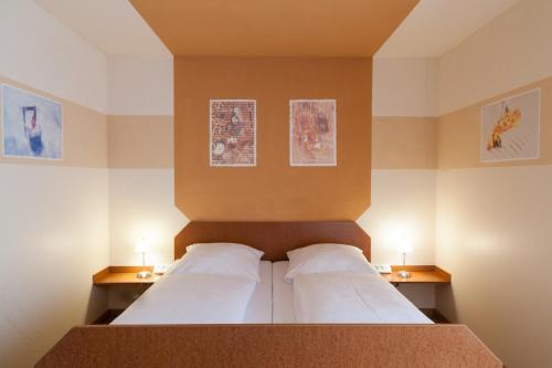 Imagen de la habitación del Hotel Garni Haus Zum Gutenberg. Foto 6