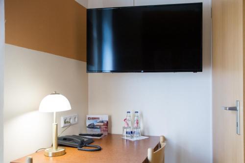 Imagen de la habitación del Hotel Garni Haus Zum Gutenberg. Foto 10