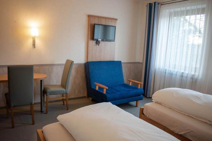 Imagen de la habitación del Hotel Garni Illertal. Foto 3