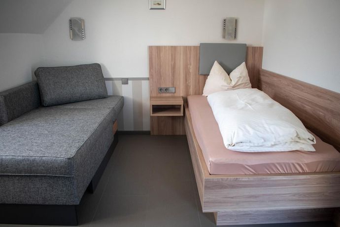 Imagen de la habitación del Hotel Garni Illertal. Foto 4