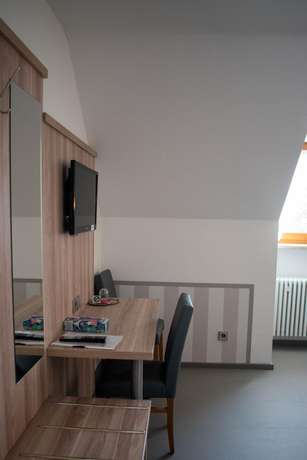 Imagen de la habitación del Hotel Garni Illertal. Foto 14